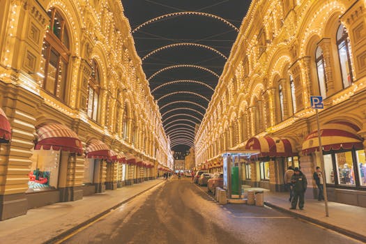 Gorgeous night view of the GUM shopping center in Moscow, adorned with festive lights.