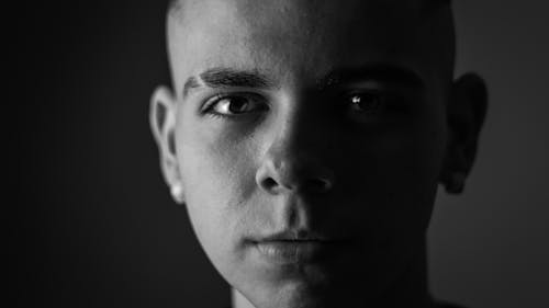 Grayscale Photo of a Man's Face