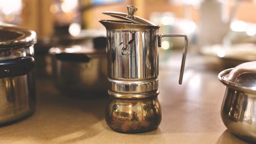 Stainless Steel Teapot on Table