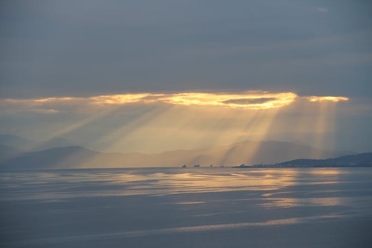 Sunlight Shining Through Clouds