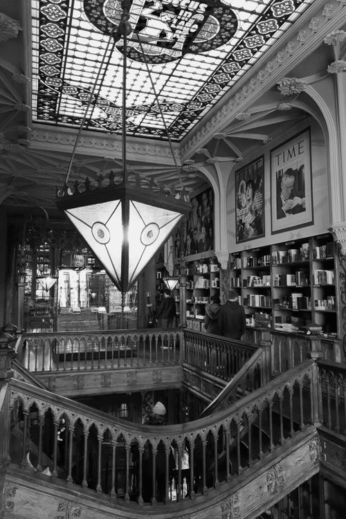 Free Black and white view inside the historic Livraria Lello bookstore, Porto, showcasing its unique architecture. Stock Photo