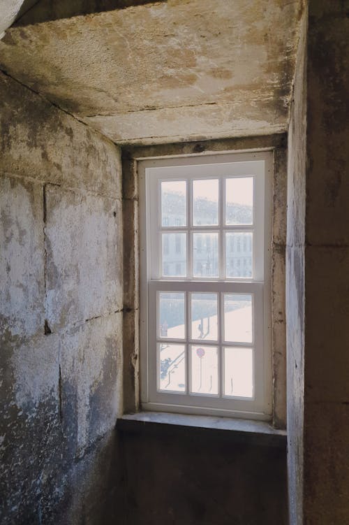 White Wooden Framed Glass Window Inside the Abandoned Building 