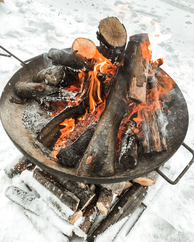 Wood Burning On A Fire Pit During Winter