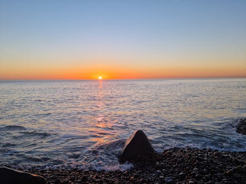 Free stock photo of beach sunset, beautiful sky, seawaves