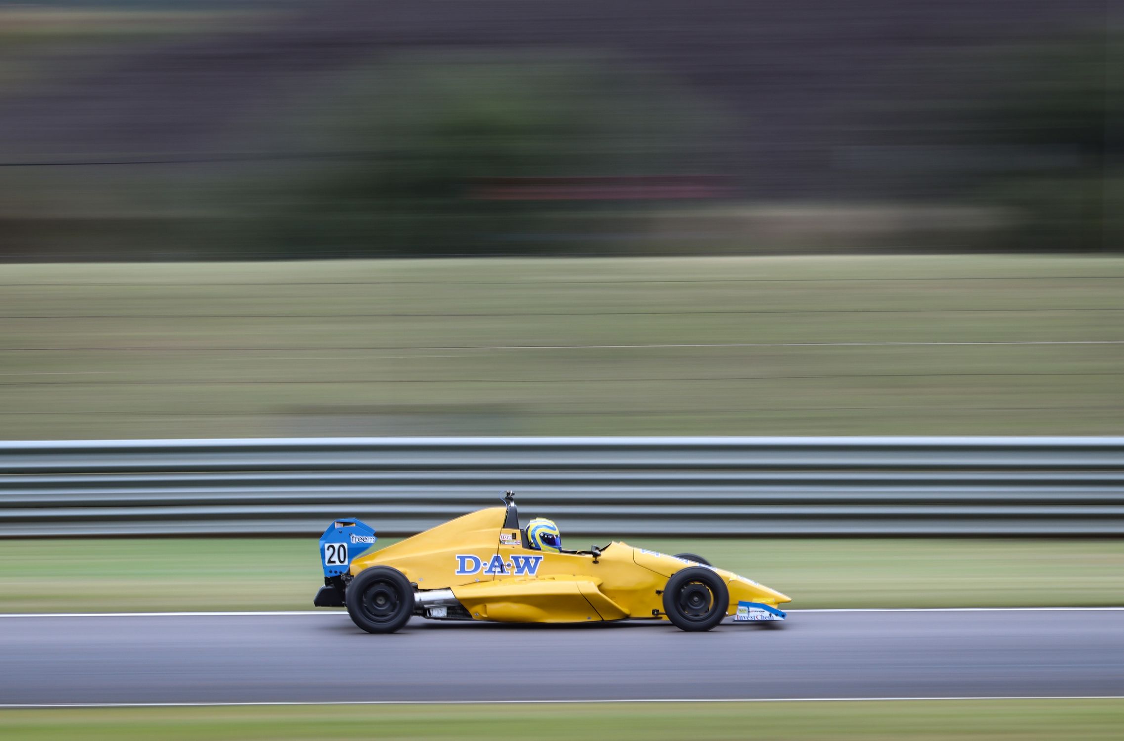 Photo of a Racing Car on the Speedway · Free Stock Photo