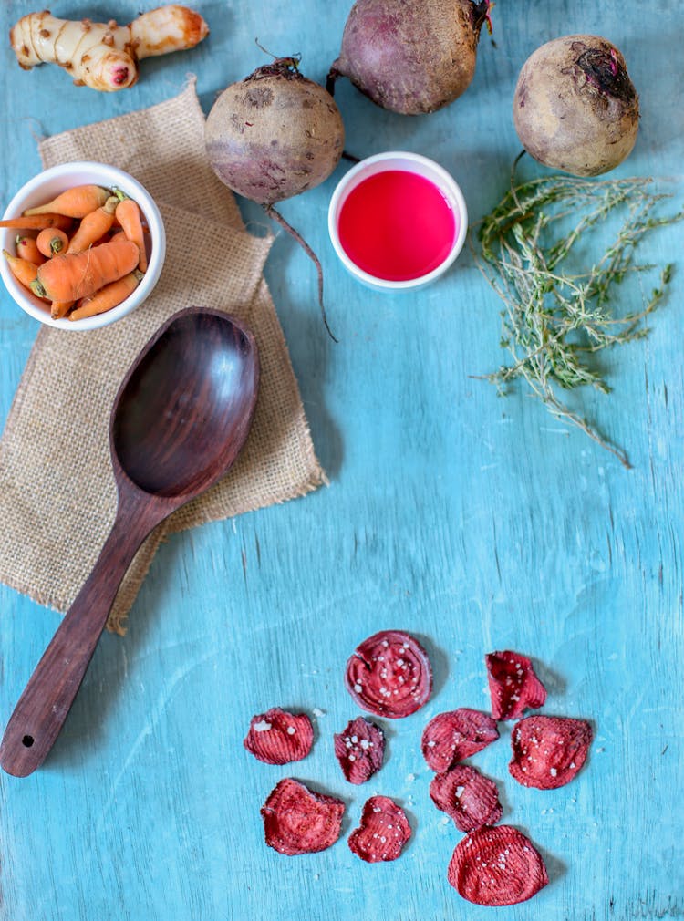 Photo Of Nutritious Root Crops And A Wooden Spoon