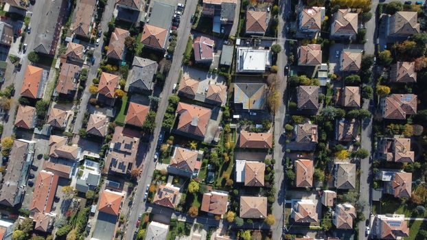 Aerial drone view of residential houses in Mirandola, Italy.