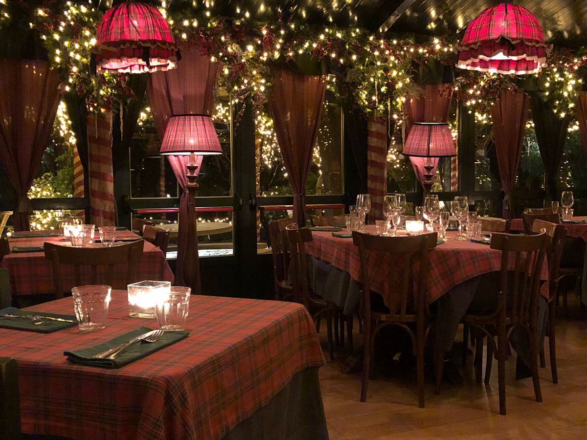 Warm, intimate dining room at Albergo Il Gembro-style family restaurant