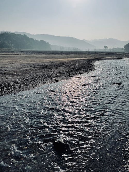 Безкоштовне стокове фото на тему «блакитна вода, вода тече, гори»