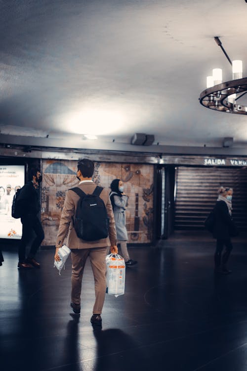 People Walking in a Metro Station