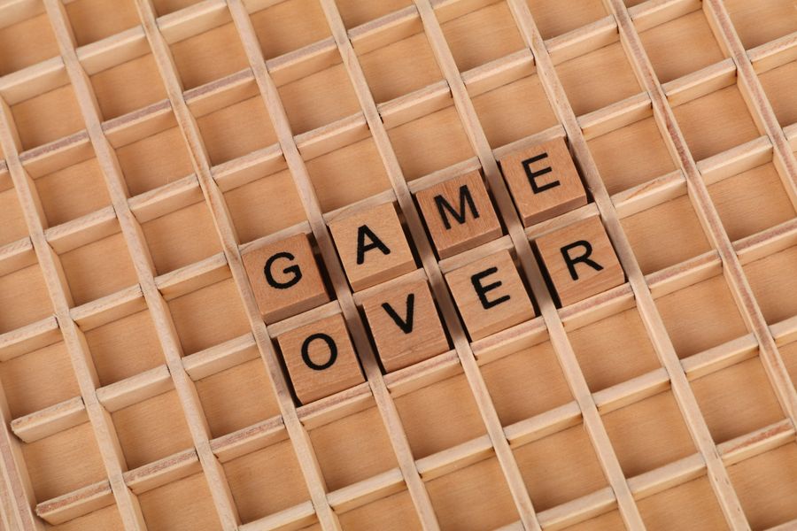 Close-up of a Ludo board in play