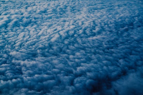 Dense White Clouds and Blue Sky