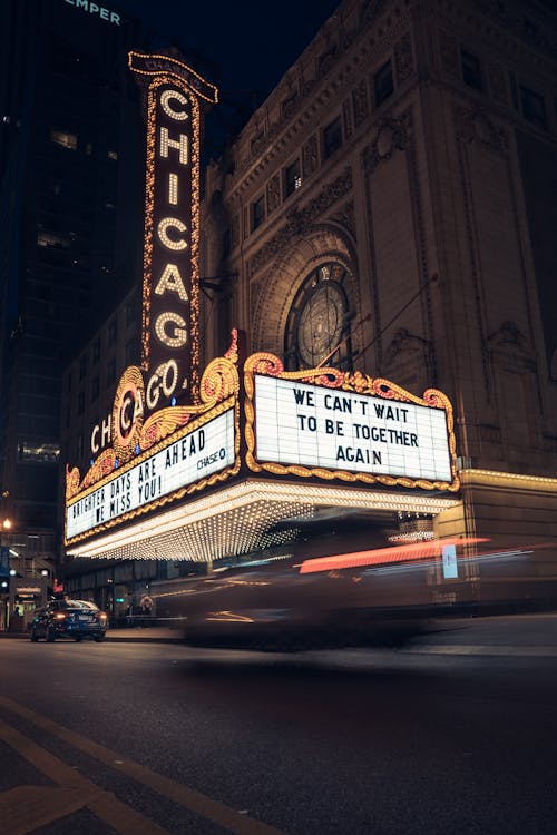 Lit Up Marquees of Chicago Theatre at Night in Chicago, USA