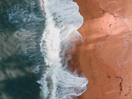 grátis Foto profissional grátis de aerofotografia, água, areia Foto profissional