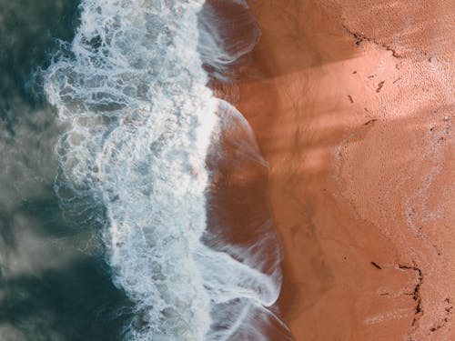 grátis Foto profissional grátis de aerofotografia, água, areia Foto profissional