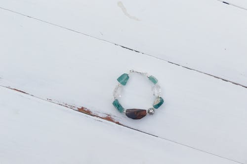 Beaded Bracelet on White Surface