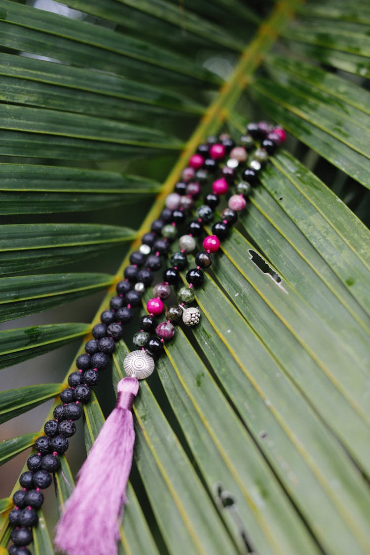 Islamic Prayer Beads On A Leaf