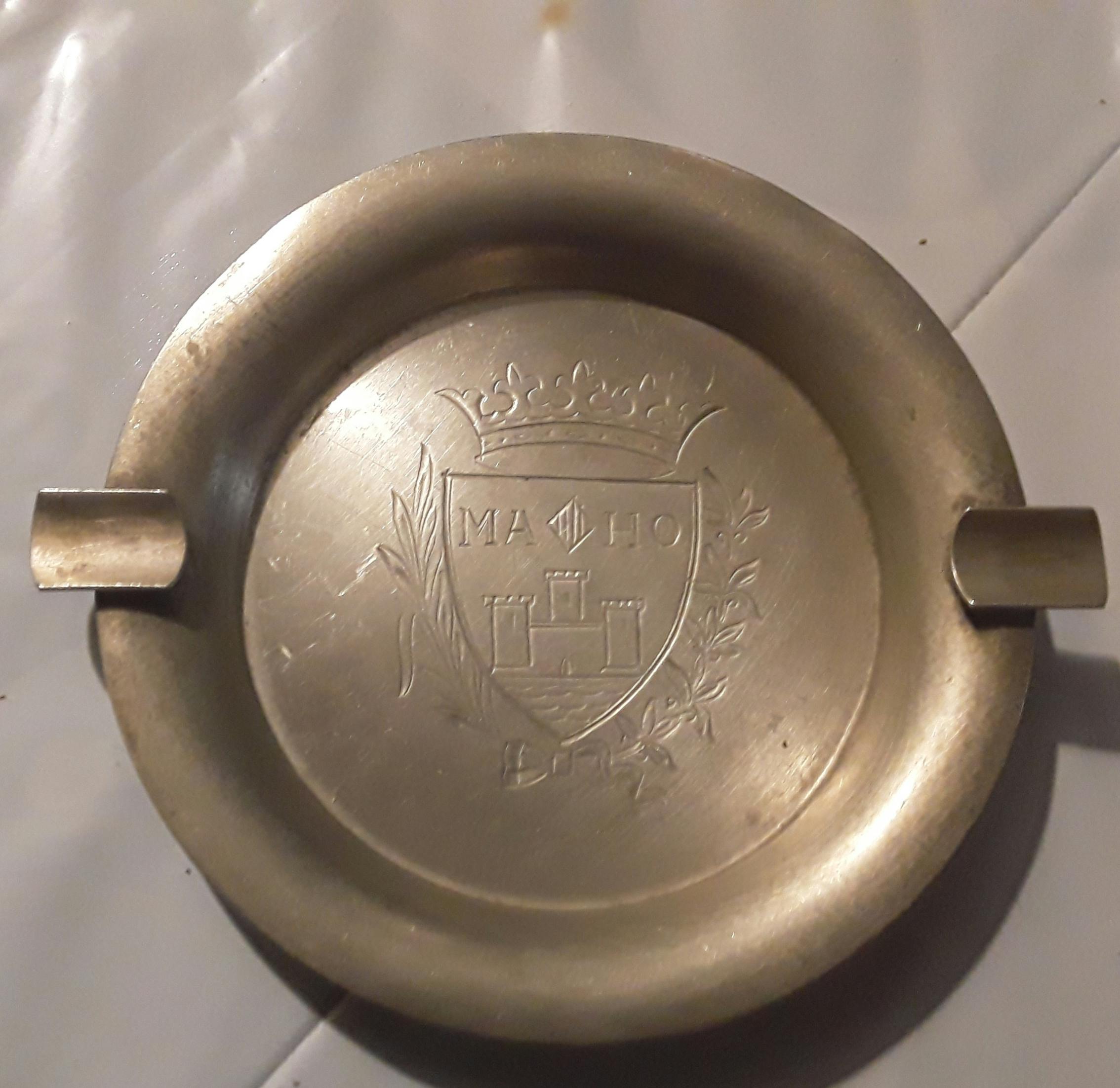 Small business owner looking over blueprints.