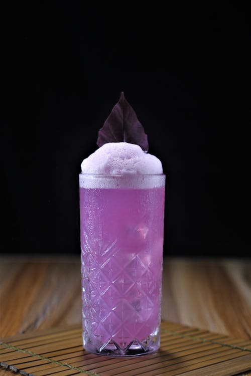 Purple Liquid in Clear Drinking Glass