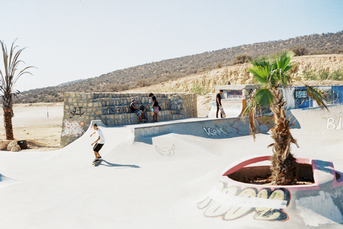 Free A vibrant scene of skateboarders enjoying the skatepark in Tarseot, Morocco. Stock Photo