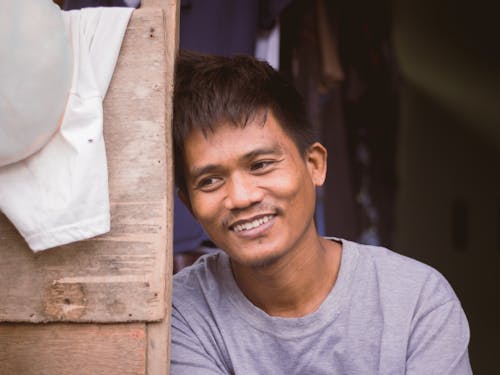 Free Man in Gray Shirt Smiling Stock Photo