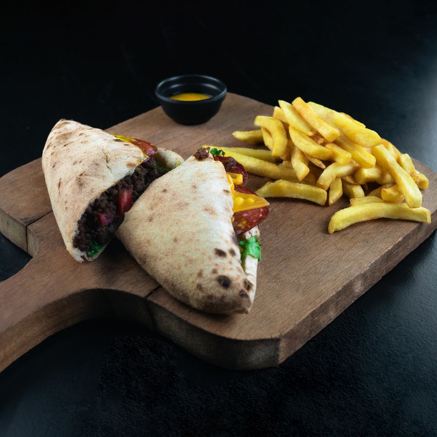 Steak and cheese pita sandwich