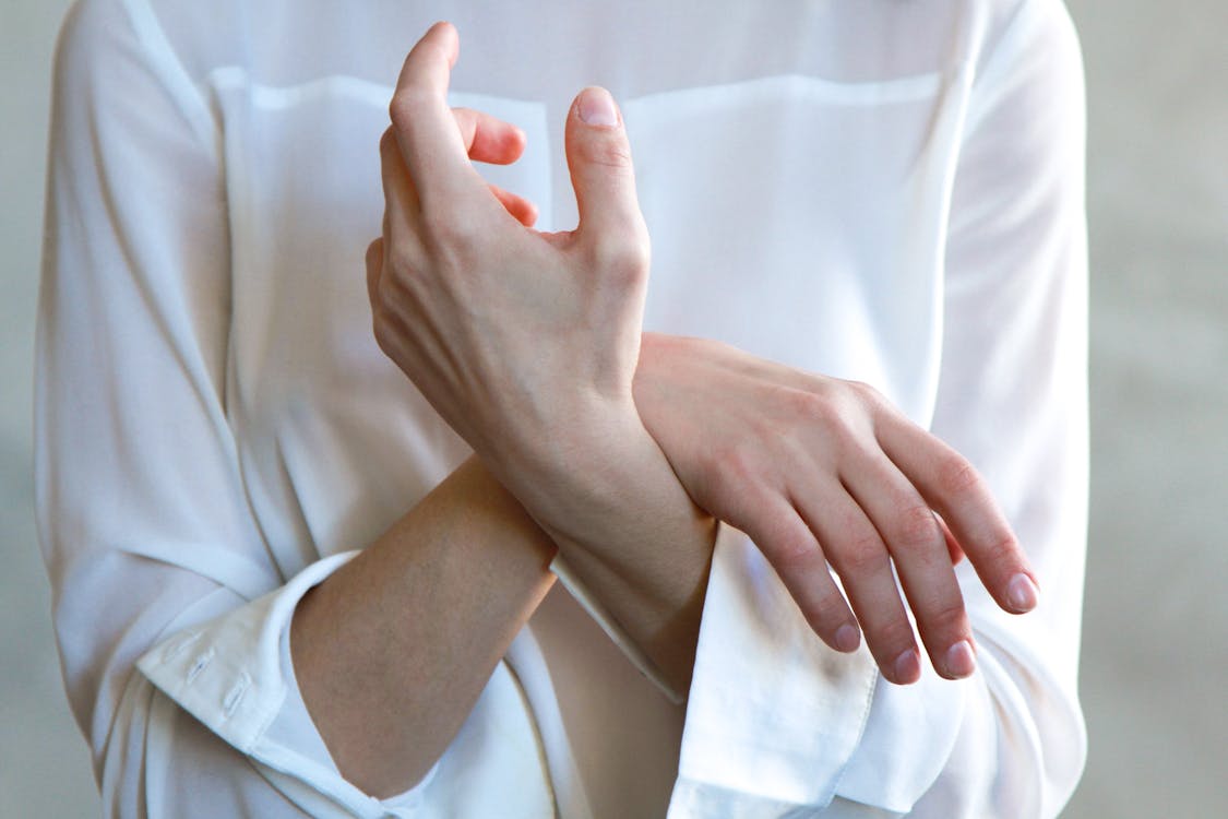 Free Women's White Long-sleeved Top Stock Photo