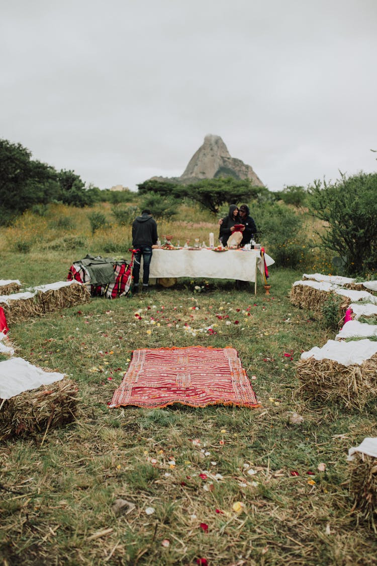 People Preparing And Outdoor Reception