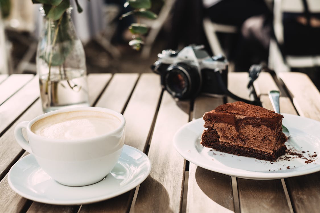 Chocolate Cake Near Milk on Cup