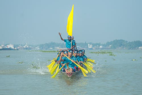 Men on Canoe During Traditional Boat Race in Khulna, Bangladesh