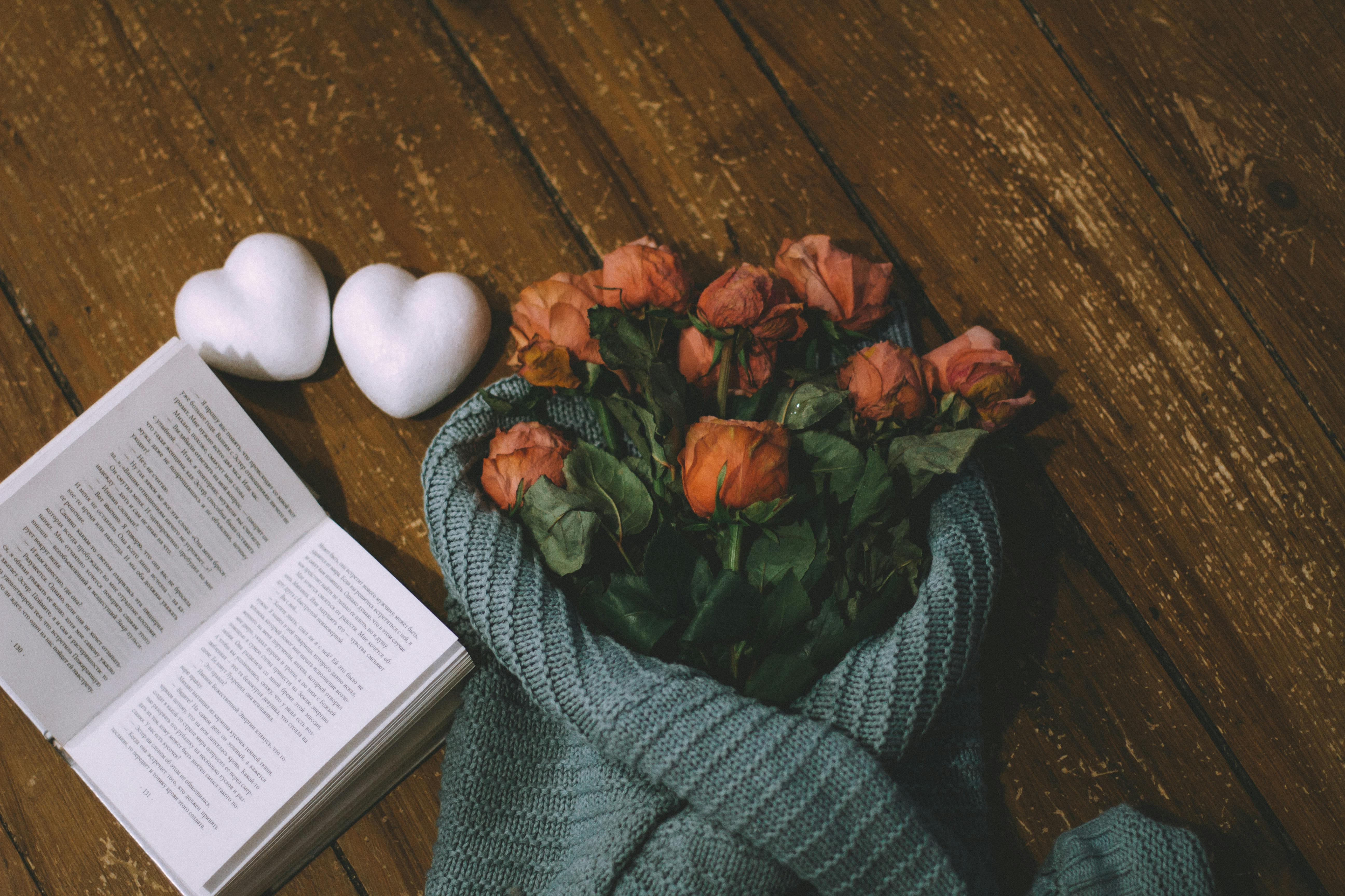 White Heart Shapes Near A Bouquet Of Roses · Free Stock Photo