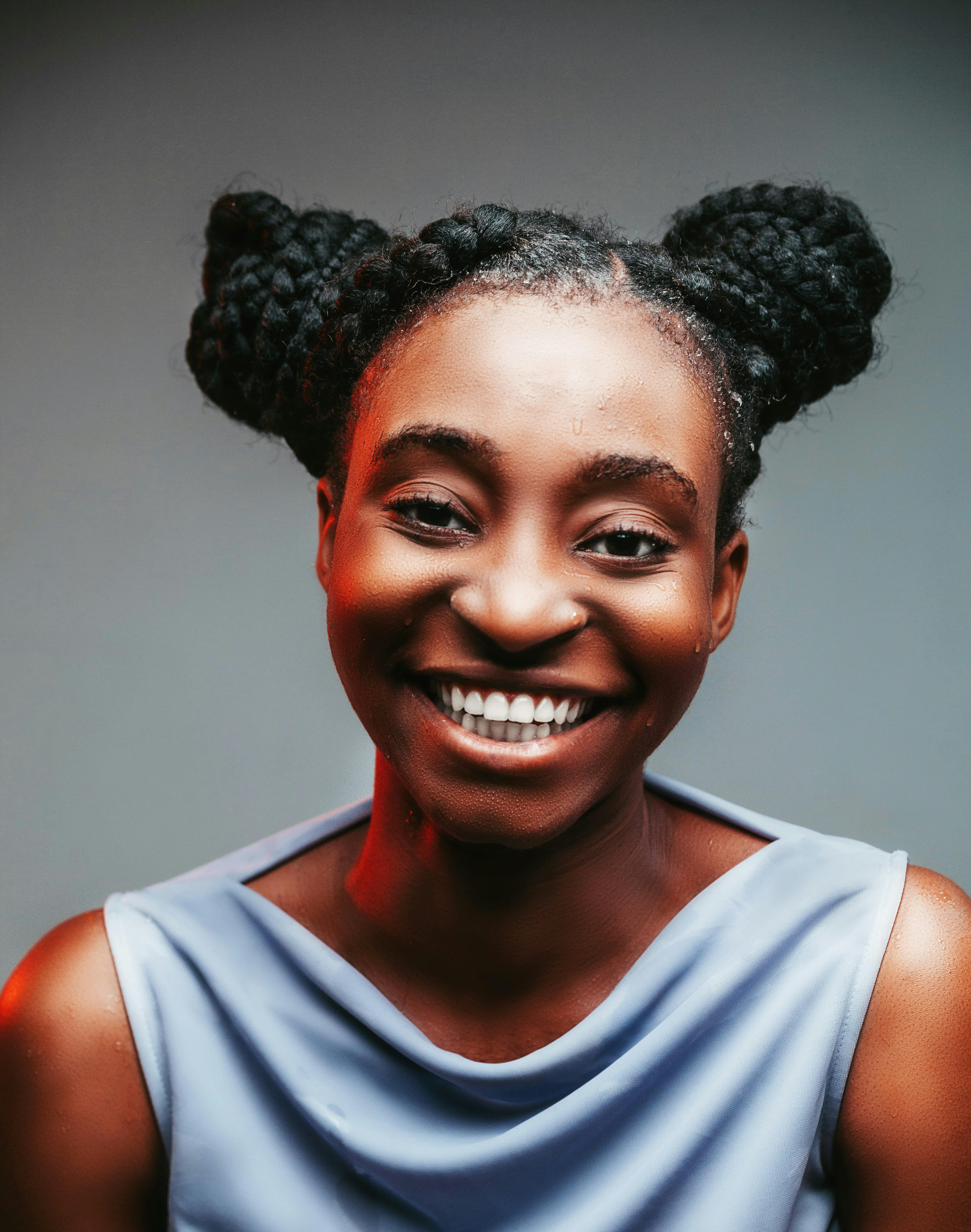 Woman with Space Buns Hairstyle Smiling · Free Stock Photo