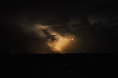 Free Lightining Strike Illuminating Night Sky Stock Photo