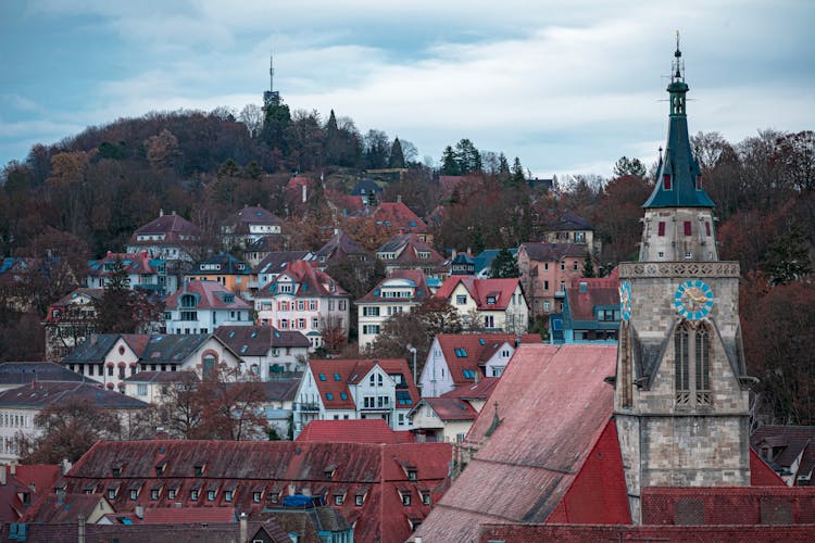 St. Georgess Collegiate Church And Rooftops Of Buildings In Tuebingen, Germany 