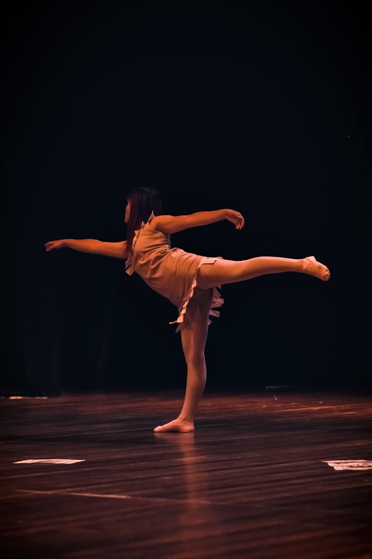 Woman Dancing On Stage