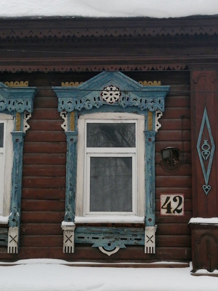 A Window Of A Wooden House