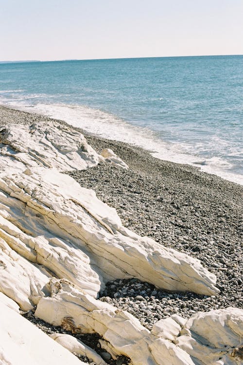 Free Scenic Shot of a Rocky Beach Stock Photo