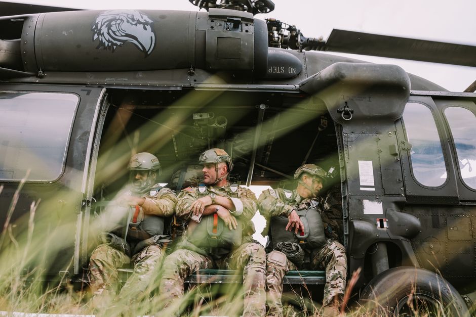 Navy SEAL Team 4 operators on a training exercise in a riverine environment Navy SEAL Team 4 operators on a training exercise in a riverine environment
