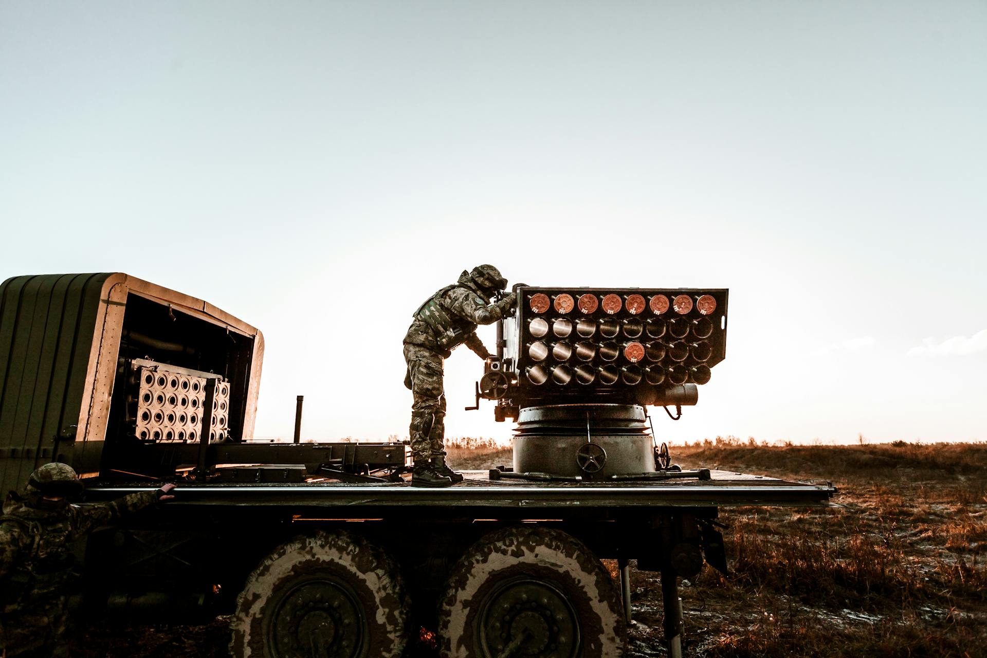 Soldier on the Back of Military Truck