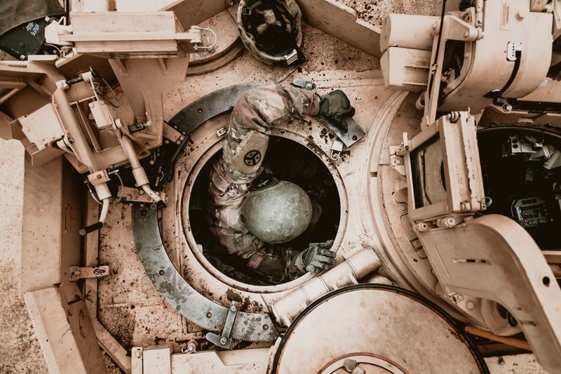 Crew member with protected ground vehicle