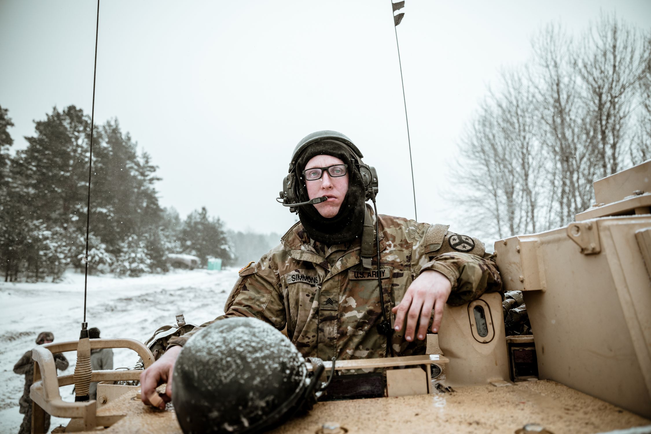 Man Rides Tanks A Military Personnel Riding a Tank · Free Stock Photo