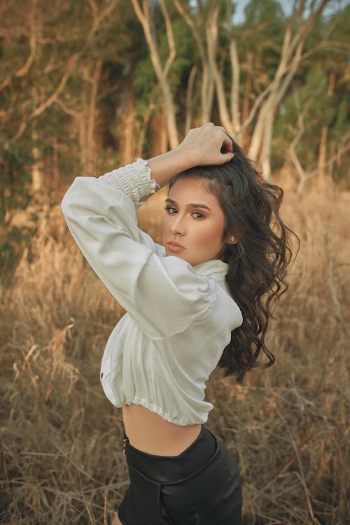 A Woman Posing in the Woods