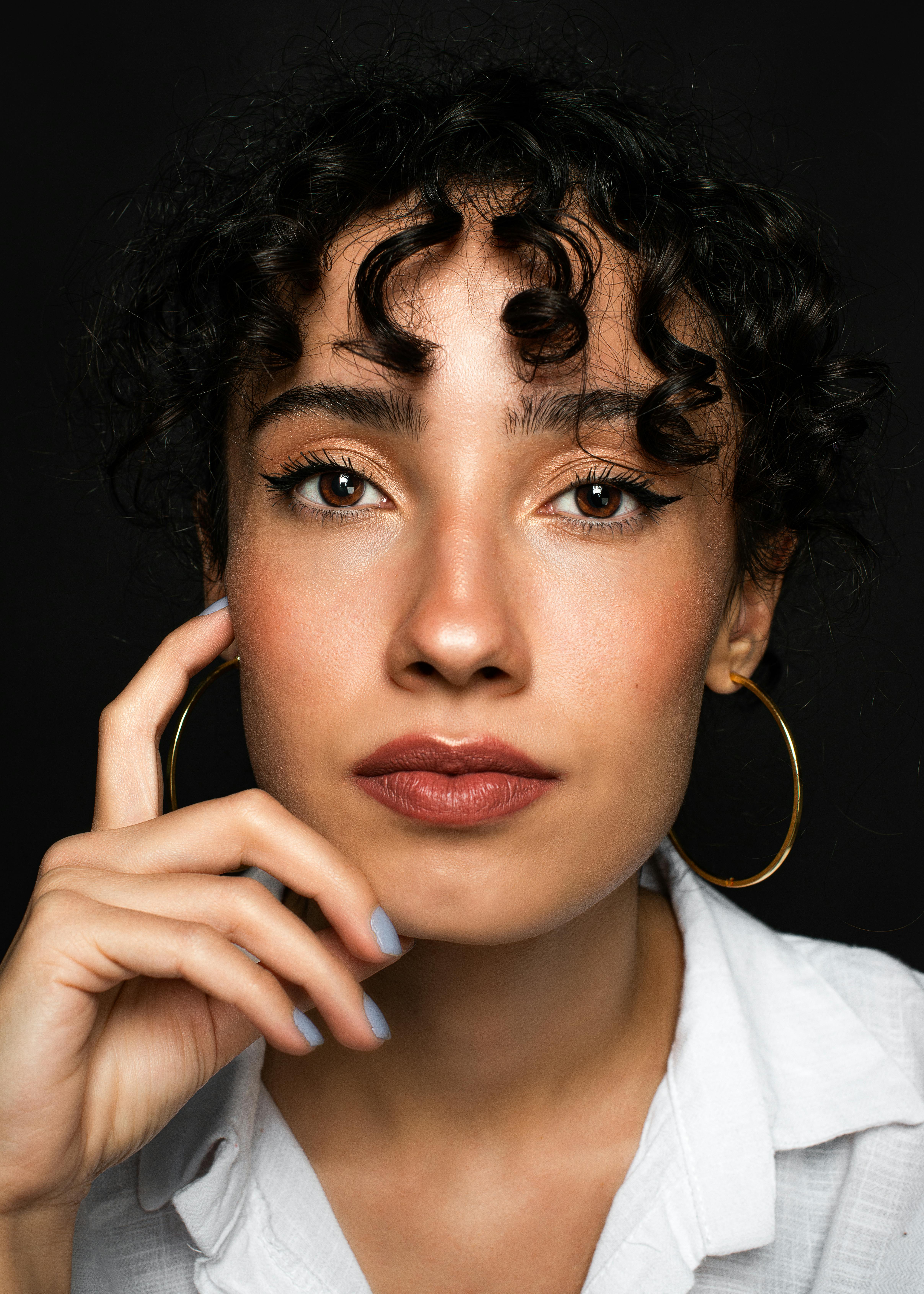 Woman with Dark Curly Hair and Brown Eyes · Free Stock Photo Woman with Dark Curly Hair and Brown Eyes · Free Stock Photo
