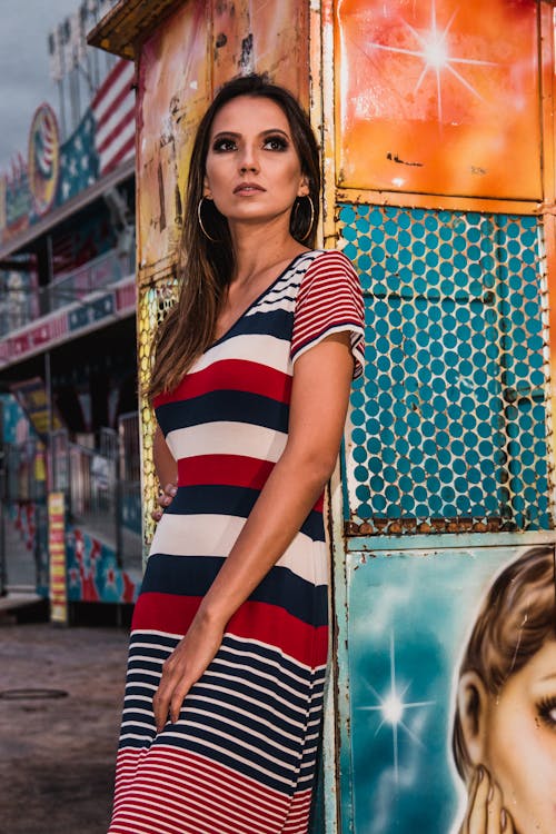 Woman Wearing White, Red, and Blue Stripe Dress