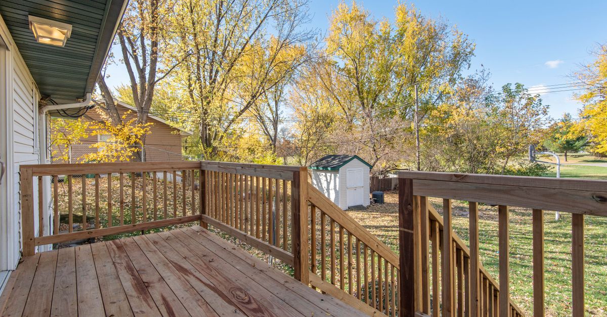 Wooden backyard deck in autumn light, well kept and ready for use