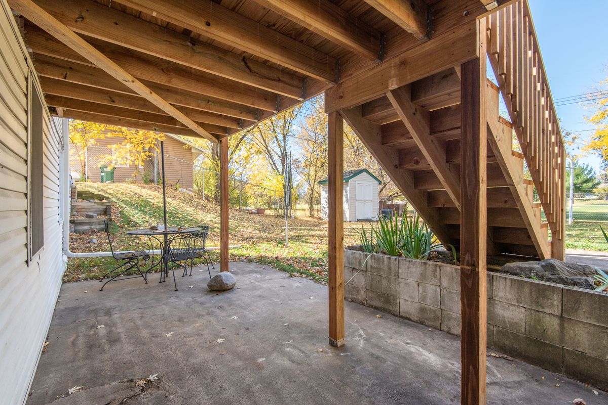 Under-deck framing and stairs showing why homeowners should look beyond surface-level deck photos