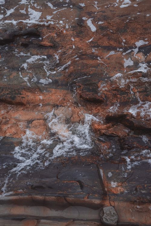 Free Close-up view of a weathered rock surface with mineral deposits in Tuapse, Russia. Stock Photo