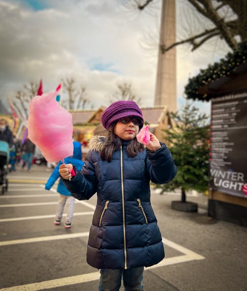 Girl Eating Cotton Candy