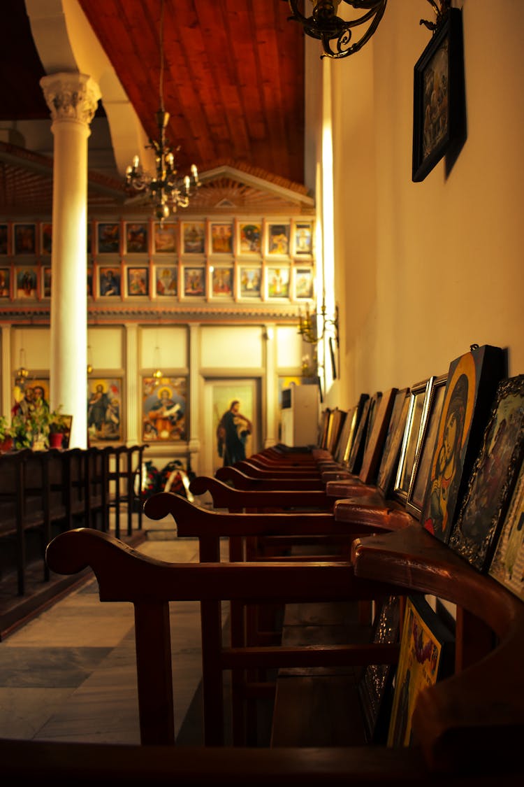 Brown Wooden Chairs With Religious Icons