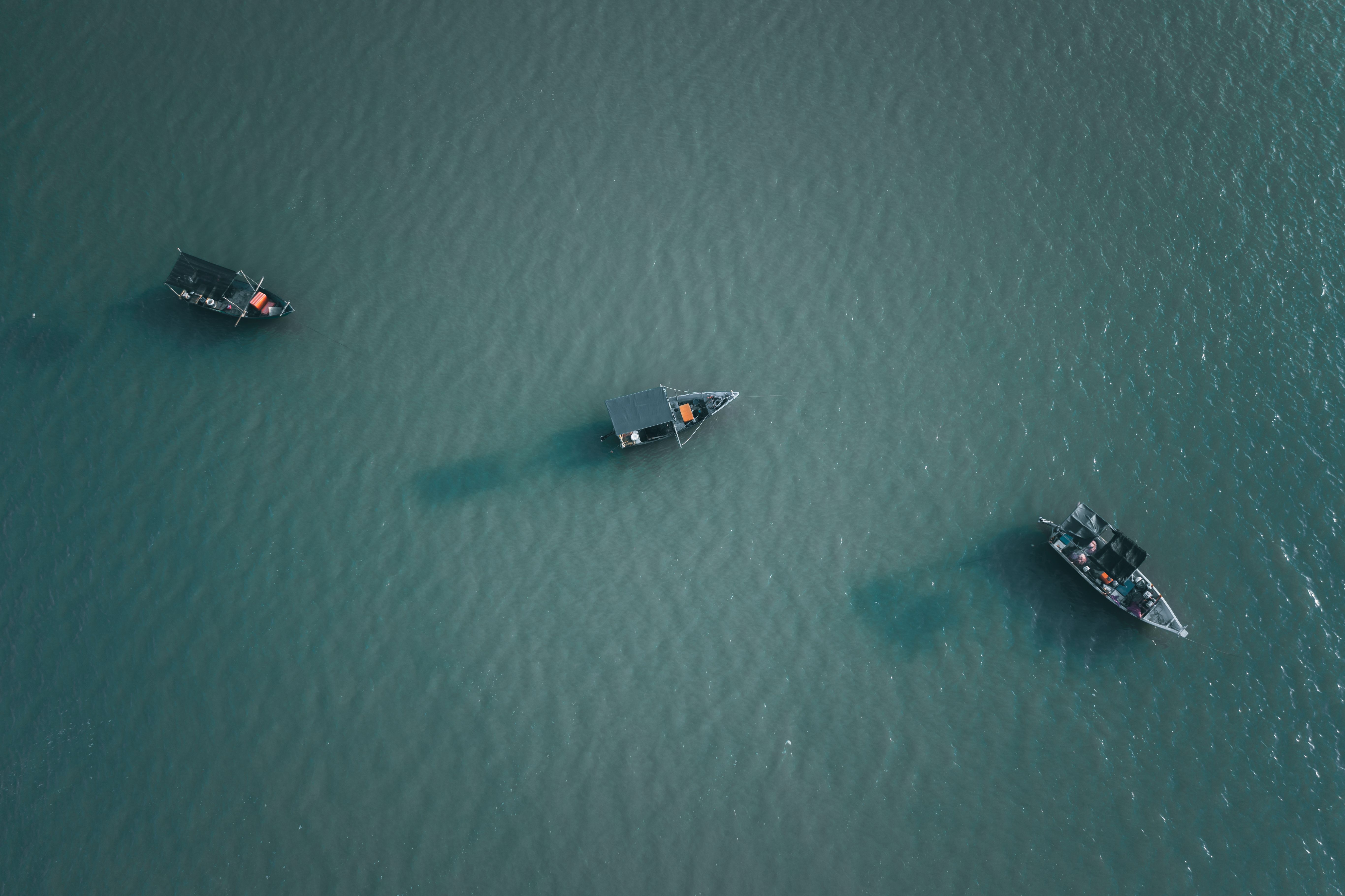 Aerial Photo of Boats on Body of Water · Free Stock Photo